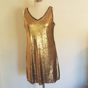 Gold and black sequin dress